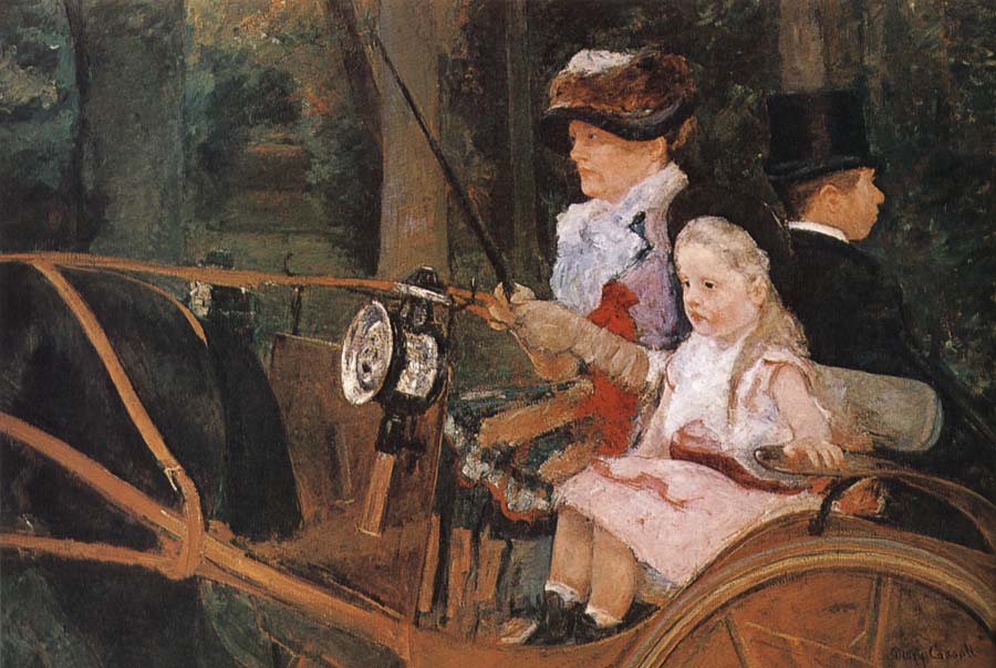 The woman and the child are driving the carriage